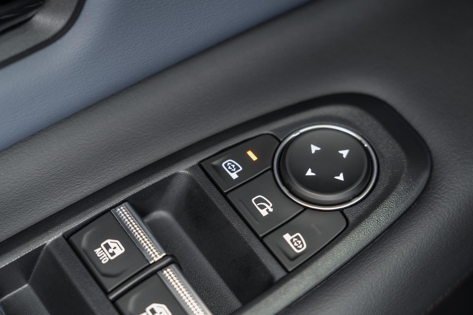 detailed shot of dials on the centre console area