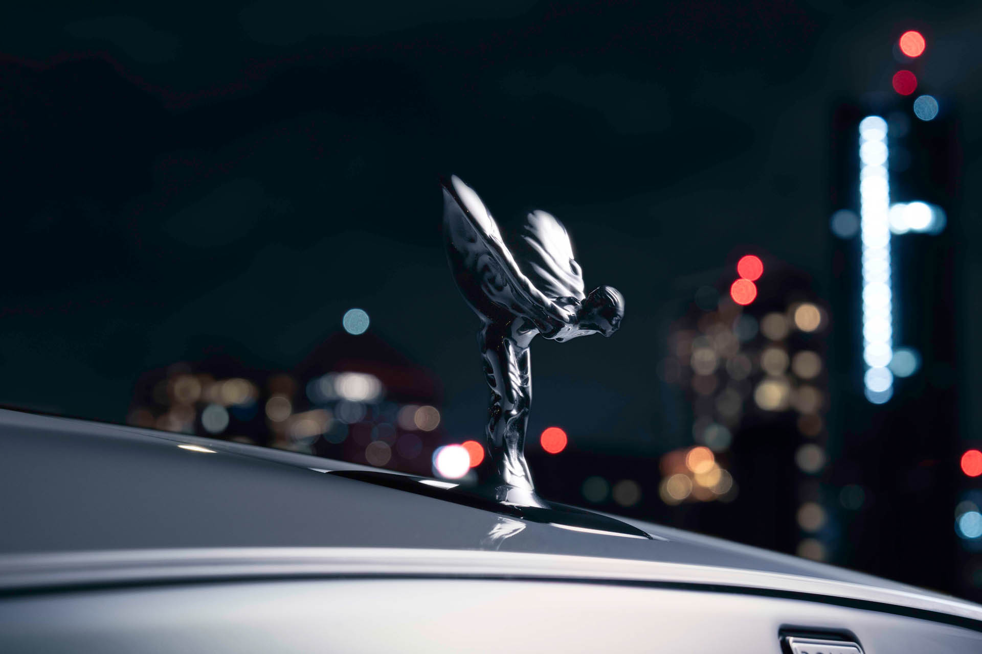 rolls-royce black badge ghost city lights