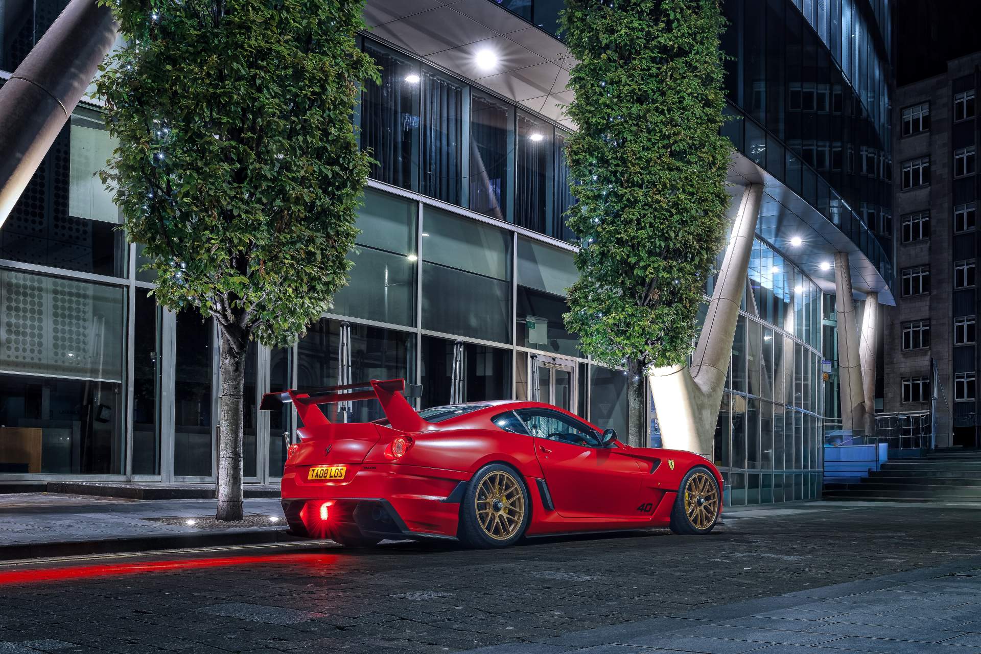 TALOS Ferrari XXT parked night